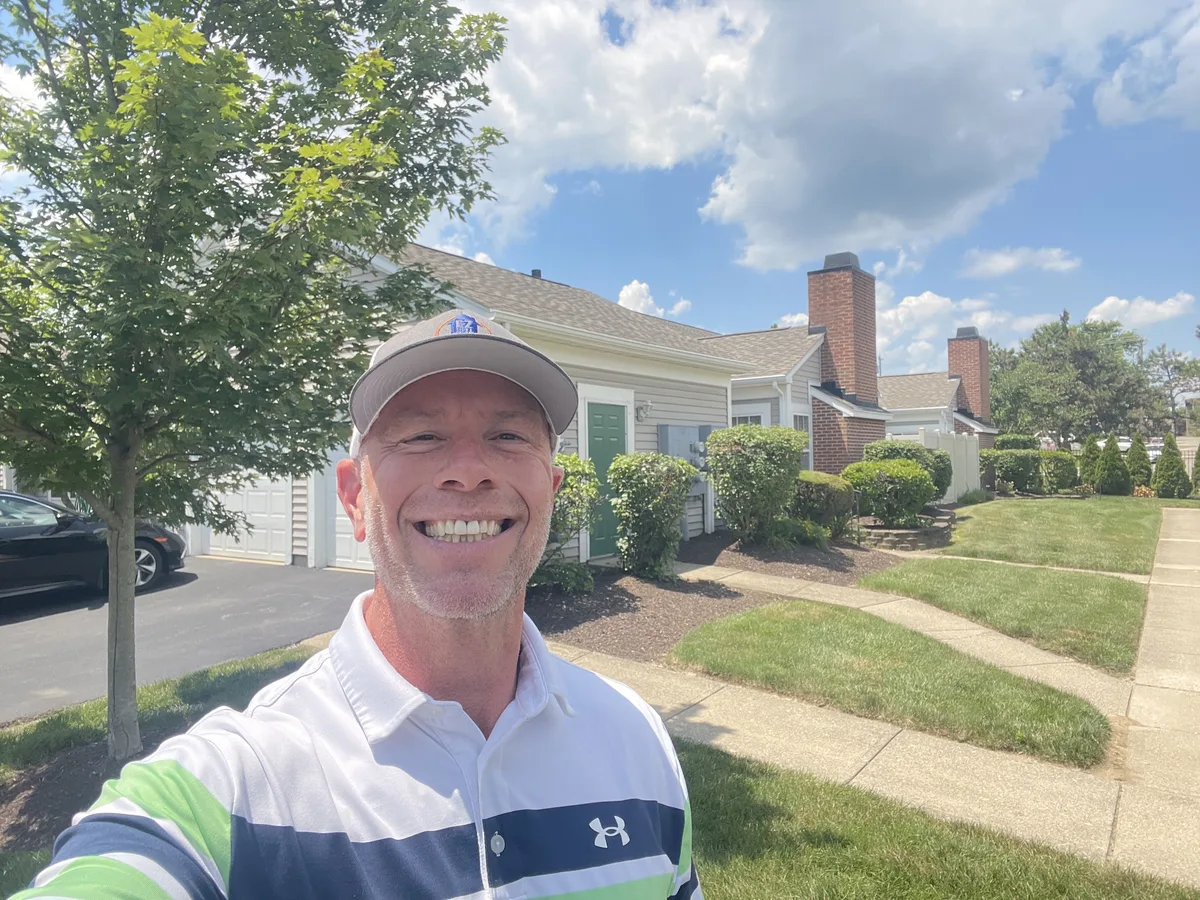 Mike Wall meeting with a Springfield Ohio homeowner about selling an inherited property