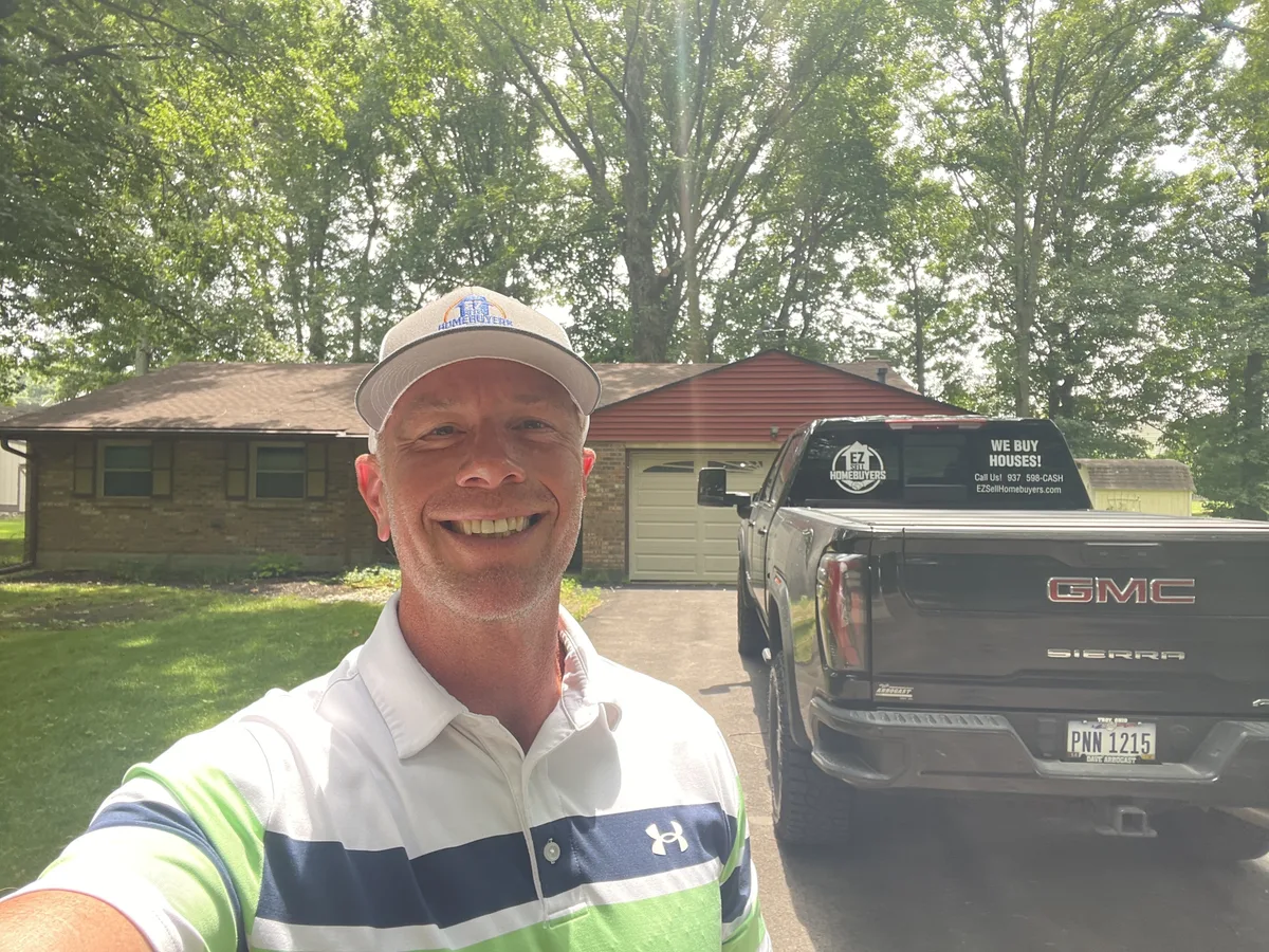 Mike Wall helping a military family sell their house fast in New Carlisle Ohio